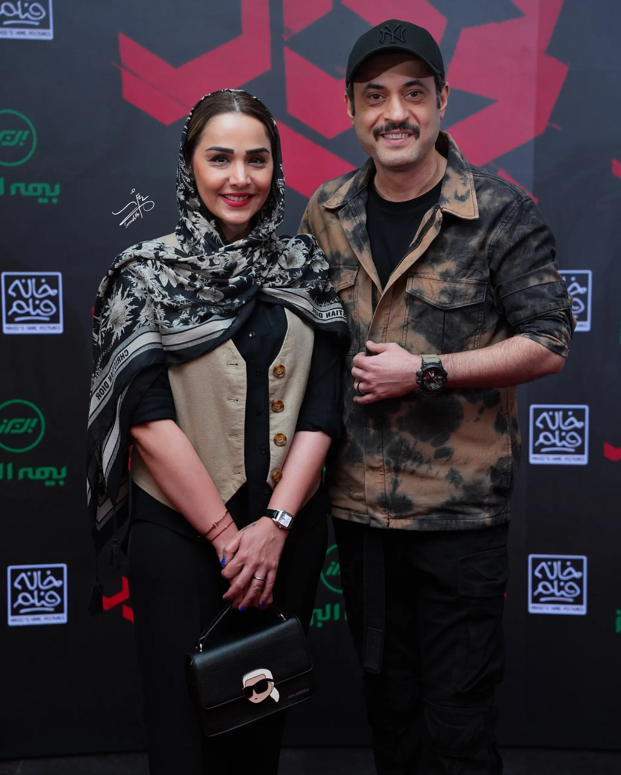 روزبه معینی و همسرش