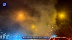 پشت پرده دود غلیظ خیابان انقلاب تهران