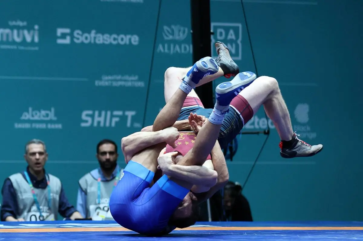 تصویر قهرمانان کشتی ایران پیش از شروع جنگ مدال +عکس