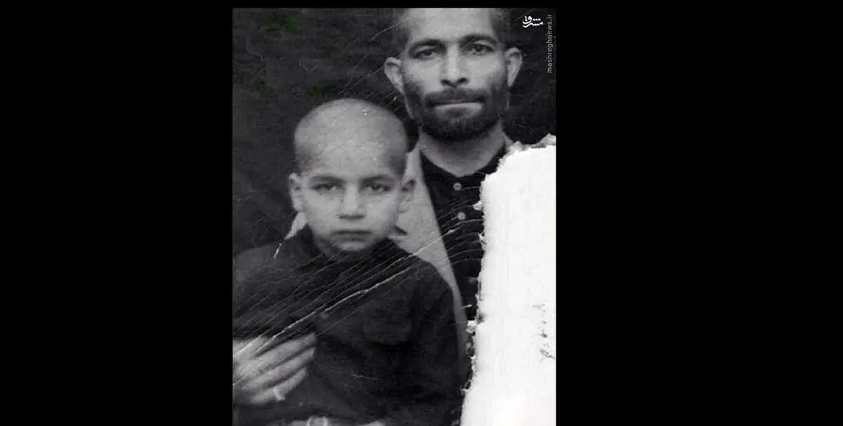 حسن روحانی در آغوش پدر