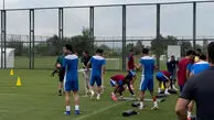 آغاز گرم کردن بازیکن های تیم ملی برای شروع اولین تمرین جدی در اردوی ترکیه