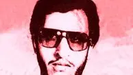 شعارنویسی روی سنگ قبر سعید امام