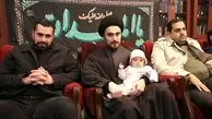 ببینید | عکس جدید از ایران خمینی در آغوش پدرش