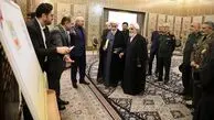 عکس | امضای یادگاری مخبر و محمدی گلپایگانی بر تمبر یابود مجلس دوازدهم