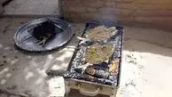 لباس‌های کاموایی خیس روی بخاری وسط یک روز برفی