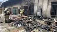 آتش سوزی یک فروشگاه کفش زیر پل روشندلان