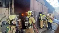 مرگ دو کارگر در پی حریق انبار چوب و کارتن در جاده ساوه