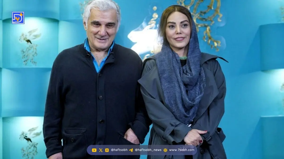 عکس| مهدی هاشمی و زن جوانش؛ پالتو قرمز همسر آقای بازیگر جلب توجه کرد