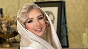 دکوراسیون خانه مرجانه گلچین؛ فرش‌های ایرانی و تابلوهای پررمزوراز