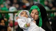حضور فرزند یک‌ماهۀ شهید حملۀ صهیونیستی در شیرخوارگان حسینی + فیلم