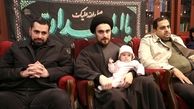 ببینید | عکس جدید از ایران خمینی در آغوش پدرش 