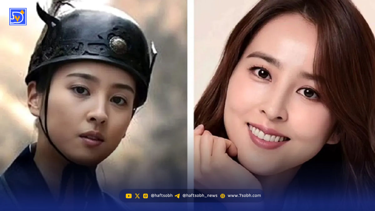 «سوسانو» و شوهرش در تالار عروسی در حال نشان دادن «قلب» به مهمانان